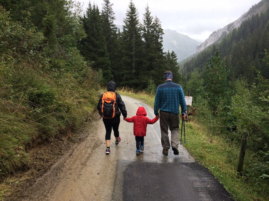 Family walking together outdoors on a forest path